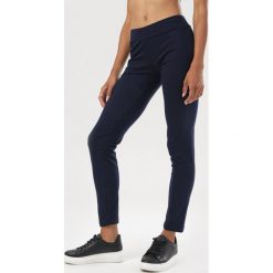 Granatowe Legginsy Helerris. Niebieskie legginsy damskie Born2be, s, bez wzorów. Za 39,99 zł.