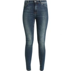 Jeansy damskie: Denim is Dead OATH Jeans Skinny Fit mid blue wash