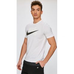 Nike Sportswear - T-shirt. Szare bez kategorii marki Nike Sportswear, s, z nadrukiem, z bawełny, z okrągłym kołnierzem. Za 139,90 zł.