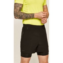 Craft - Szorty. Żółte spodenki sportowe męskie Craft, s, bez wzorów, z elastanu, sportowe. W wyprzedaży za 149,90 zł.