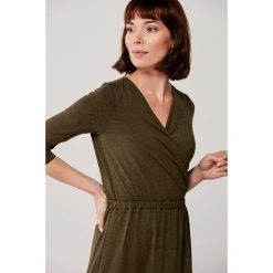 Sukienka Rita oliwkowa melanż 34 zielony. Zielone sukienki damskie na jesień, melanż, z elastanu, rozkloszowane. Za 297,00 zł.