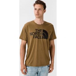 The North Face Reaxion Easy Koszulka Zielony. Zielone podkoszulki męskie The North Face, l, z nadrukiem, z poliesteru, bez kołnierzyka, z krótkim rękawem, krótkie. Za 152,95 zł.