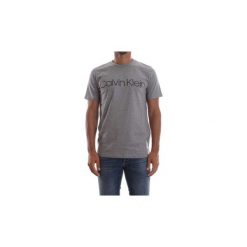 T-shirty z krótkim rękawem Calvin Klein Jeans K10K103078 COTTON FRONT LOGO. Szare t-shirty męskie Calvin Klein Jeans, s, bez wzorów, z jeansu, bez kołnierzyka, krótkie. Za 122,52 zł.