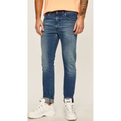 Diesel - Jeansy Thommer. Niebieskie jeansy męskie Diesel, z aplikacjami. Za 699,90 zł.