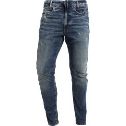 GStar DSTAQ 3D SKINNY Jeans Skinny Fit medium aged antic destroy. Niebieskie rurki męskie G-Star, z bawełny. Za 749,00 zł.