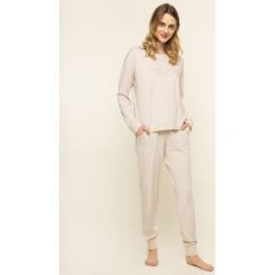 Piżama DKNY YI2919259. Niebieskie piżamy damskie DKNY, xs, bez wzorów, z bawełny, bez rękawów. W wyprzedaży za 229,00 zł.
