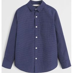 Mango Kids - Koszula dziecięca 116 - 164 cm. Białe koszule chłopięce z bawełny, eleganckie, długie. Za 59,90 zł.