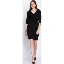 Czarna Sukienka Black Out. Sukienki małe czarne marki Born2be, na jesień, l, oversize. Za 49,99 zł.