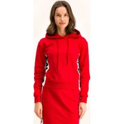 Bluza LOVE MOSCHINO W639001E 2117. Czarne bluzy damskie Love Moschino, bez wzorów, z elastanu, bez rękawów, bez kaptura. W wyprzedaży za 459,00 zł.