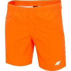 Spodenki treningowe męskie SKMT001B - pomarańcz. Spodenki sportowe męskie 4f, m, bez wzorów, z tkaniny, sportowe. W wyprzedaży za 64,99 zł.