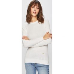 Tommy Hilfiger - Sweter. Niebieskie swetry damskie TOMMY HILFIGER, s, bez wzorów, z bawełny, z krótkim rękawem, krótkie, bez kaptura. W wyprzedaży za 359,90 zł.