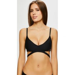 Calvin Klein Jeans - Biustonosz kąpielowy. Czarne stroje kąpielowe damskie marki Calvin Klein Jeans, s, bez wzorów, z elastanu. W wyprzedaży za 199,90 zł.