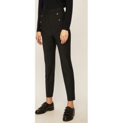 Tommy Hilfiger - Spodnie. Niebieskie spodnie damskie TOMMY HILFIGER, bez wzorów, z elastanu. W wyprzedaży za 429,90 zł.
