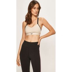 Reebok - Biustonosz sportowy. Biustonosze sportowe damskie Reebok, s, bez wzorów, z elastanu. Za 119,90 zł.
