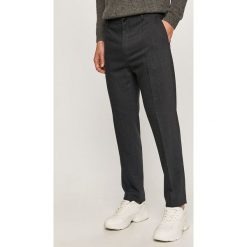 Calvin Klein - Spodnie. Niebieskie spodnie męskie Calvin Klein, na co dzień, bez wzorów, z elastanu. Za 599,90 zł.