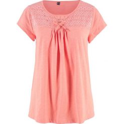 Shirt bawełniany z przędzy mieszankowej ze sznurowaniem bonprix łososiowo-jasnoróżowy. Różowe koszulki damskie bonprix, bez wzorów, z bawełny, bez kołnierzyka, bez rękawów. Za 27,99 zł.