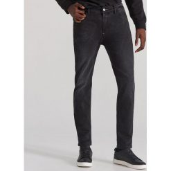 Jeansowe spodnie high flex - Czarny. Czarne spodnie męskie Reserved, m, bez wzorów, z jeansu. Za 149,99 zł.