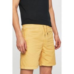Quiksilver - Szorty. Żółte spodenki i szorty męskie Quiksilver, s, bez wzorów, z bawełny, casualowe. W wyprzedaży za 179,90 zł.