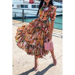 Sukienka SANDIMA ORANGE. Pomarańczowe sukienki damskie IVET, na co dzień, bez wzorów, eleganckie, bez kołnierzyka, bez rękawów, długie. W wyprzedaży za 119,00 zł.