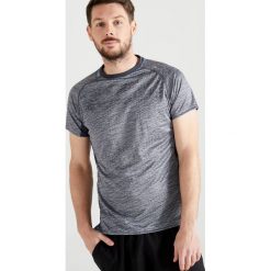 Koszulka fitness cardio FTS 120 męska. Szare koszulki męskie DOMYOS, s, bez wzorów, z poliesteru, bez kołnierzyka, bez rękawów. Za 29,99 zł.