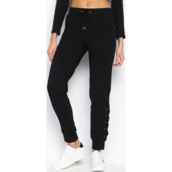Czarne Spodnie Dresowe Interlace. Czarne spodnie dresowe damskie marki Born2be, s, z dresówki. Za 34,99 zł.