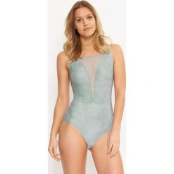 BODY eNNA. Różowe body damskie LingaDore, bez wzorów, z materiału. Za 307,99 zł.