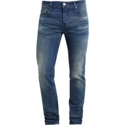 GStar 3301 LOW TAPERED Jeansy Relaxed Fit firro denim. Niebieskie jeansy męskie relaxed fit G-Star. Za 459,00 zł.