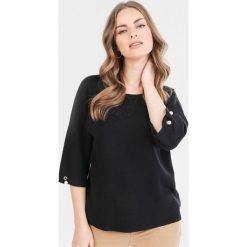 Czarny Sweter Ristila. Czarne swetry damskie Born2be, s, bez wzorów, bez rękawów, bez kaptura. Za 99,99 zł.