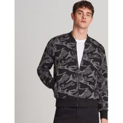 Bluza ze strukturalnym wzorem - Czarny. Czarne bluzy męskie Reserved, s, bez wzorów, bez kołnierzyka, bez rękawów, bez kaptura. Za 159,99 zł.
