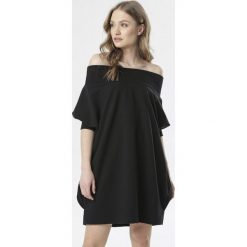 Czarna Tunika Themala. Czarne tuniki damskie Born2be, s, bez wzorów, z jeansu, bez kołnierzyka, bez rękawów. Za 69,99 zł.
