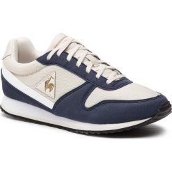 Sneakersy LE COQ SPORTIF - Alpha II W Sport 1910526 Dress Blue/Turtle Dove. Brązowe półbuty damskie le coq sportif, na co dzień, bez wzorów, ze skóry ekologicznej, sportowe, bez obcasa, na płaskiej podeszwie, bez zapięcia. W wyprzedaży za 209,00 zł.