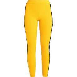 Legginsy: Ivy Park LOGO ELASTIC Legginsy old gold