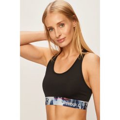 Reebok - Biustonosz sportowy. Czarne biustonosze sportowe damskie Reebok, s, z nadrukiem, z elastanu. Za 99,90 zł.