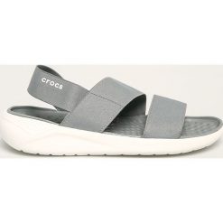 Crocs - Sandały. Różowe klapki damskie Crocs, bez wzorów, z gumy, bez obcasa, na obcasie. W wyprzedaży za 179,90 zł.