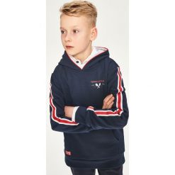 Bluza z kapturem - Granatowy. Niebieskie bluzy chłopięce rozpinane marki DOMYOS. Za 99,99 zł.