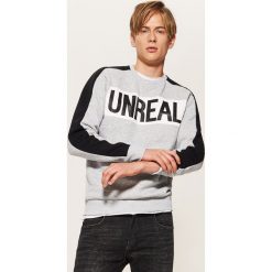 Bluza z napisem Unreal - Szary. Szare bluzy męskie rozpinane House, l, z napisami. Za 79,99 zł.