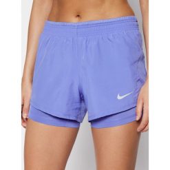 Szorty sportowe NIKE 2-In-1 Running CK1004. Fioletowe spodnie damskie Nike, m, z poliesteru. Za 129,00 zł.