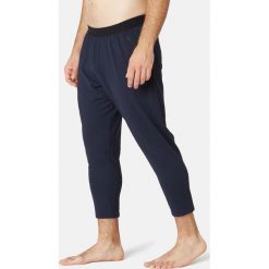 Spodnie dresowe 7/8 Gym & Pilates 560 męskie. Niebieskie spodnie męskie NYAMBA, m, bez wzorów, z elastanu. Za 109,99 zł.