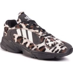 Buty adidas - Yung-1 EG8726 Cblack/Owhite/Sbrown. Pomarańczowe półbuty męskie Adidas, na co dzień, bez wzorów, ze skóry, klasyczne, bez zapięcia. W wyprzedaży za 479,00 zł.