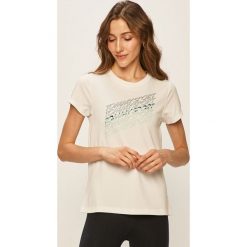 Tommy Sport - T-shirt. Białe topy damskie Tommy Sport, s, z nadrukiem, z poliesteru, z krótkim rękawem. W wyprzedaży za 139,90 zł.