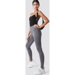 Nicki x NA-KD Legginsy z jerseyu - Grey. Szare legginsy marki Nicki x NA-KD, z jersey. Za 100,95 zł.