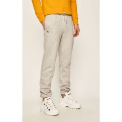 Lacoste - Spodnie. Szare spodnie męskie Lacoste, na co dzień, s, bez wzorów, z bawełny. W wyprzedaży za 299,90 zł.