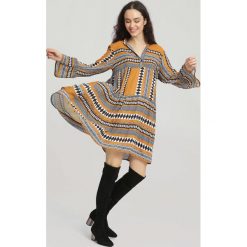CVamelowa Sukienka Backgrounds. Brązowe sukienki damskie Inny, bez wzorów, z koszulowym kołnierzykiem, bez rękawów, koszulowe. Za 79,99 zł.