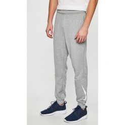 Nike - Spodnie. Szare spodnie męskie Nike, na co dzień, s, bez wzorów, z poliesteru, sportowe. W wyprzedaży za 149,90 zł.