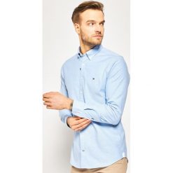 Koszula TOMMY HILFIGER Core Stretch Slim Oxford Shirt MW0MW03745. Niebieskie koszule męskie TOMMY HILFIGER, xxl, bez wzorów, z elastanu, casualowe, bez kołnierzyka, bez rękawów. Za 349,00 zł.