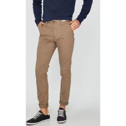 Tommy Hilfiger - Spodnie Denton Chino Org Str Twill. Szare spodnie męskie TOMMY HILFIGER, na co dzień, bez wzorów, z elastanu, casualowe. W wyprzedaży za 459,90 zł.