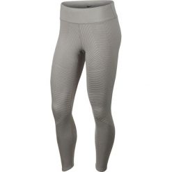Legginsy Nike Epic Lux Texture Mid-Rise Tights W Jasno-Szare. Szare spodnie damskie marki Nike, na zimę, bez wzorów, z tkaniny, do biegania, dri-fit (nike). Za 239,99 zł.