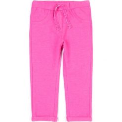 Coccodrillo - Spodnie dziecięce 62 - 86 cm. Różowe spodnie dziewczęce COCCODRILLO, s, bez wzorów, z elastanu, casualowe. Za 59,90 zł.