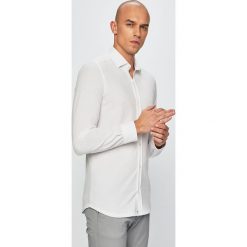 Lacoste - Koszula. Białe koszule męskie Lacoste, s, bez wzorów, z bawełny, klasyczne, z klasycznym kołnierzykiem, z długim rękawem. Za 449,90 zł.