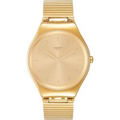 Swatch SKINLINGOT Zegarek goldcoloured. Żółte, analogowe zegarki damskie marki Swatch. Za 719,00 zł.